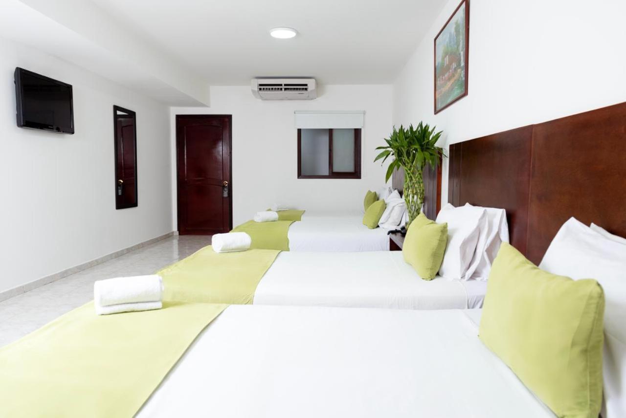 Tama Hotel Granada Real Кали Екстериор снимка