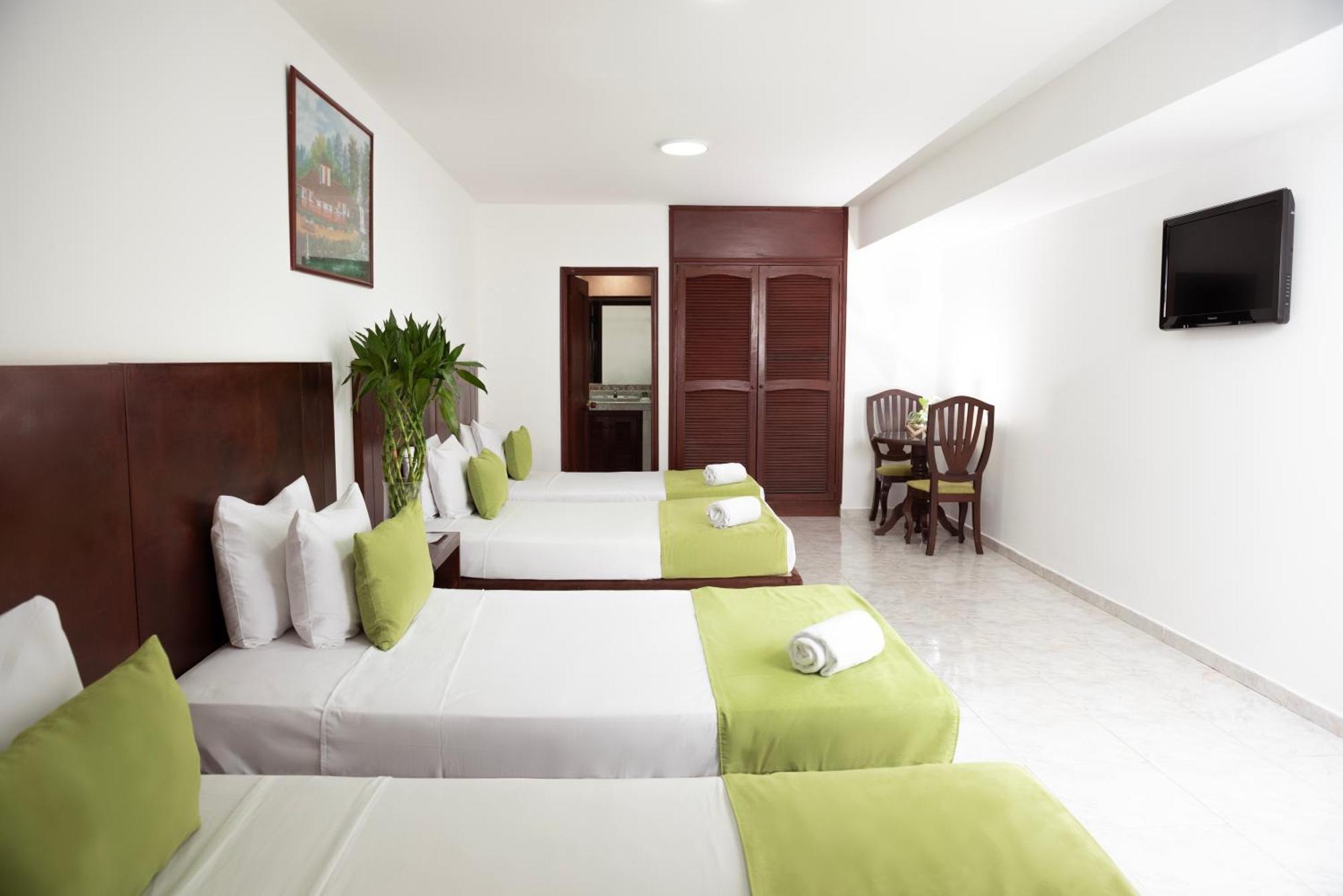 Tama Hotel Granada Real Кали Екстериор снимка